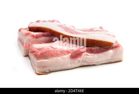 Two large lard pieces and a thin tenderloin isolated on a white background. Stock Photo
