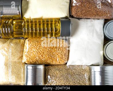 Food for donations. Healthy food for food delivery. Set of raw cereals, grains and canned food. Flat lay style. View from above. Stock Photo