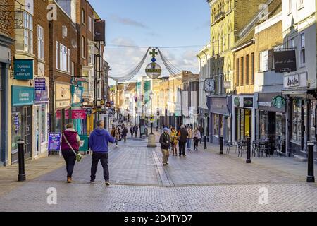 Windsor, Berkshire, UK. 11th October, 2020. The Christmas lights are up in Windsor Town Centre but there won't be an official light switch on ceremony this year. Twenty new cases of Covid-19 have been reported in the past 24 hours in the Royal Borough of Windsor and Maidenhead. The Government are expected to announce a new three tier system lockdown system for England following a second spike in positive cases. Credit: Maureen McLean/Alamy Stock Photo