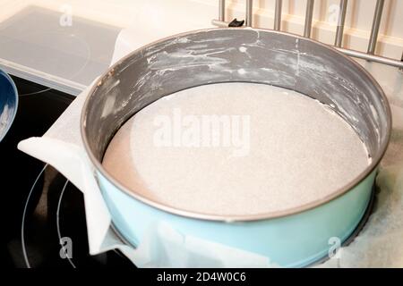 Raw dough in a mold. Baking homemade bread Stock Photo - Alamy