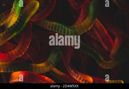 Jelly gummy worm sweet candy, Macro close up, selective focus Stock Photo