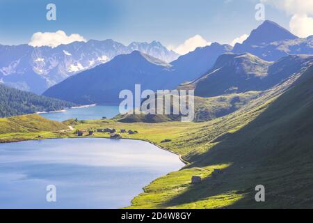 View of lake Ritom with the Alps in background, Piora, Canton Ticino of Switzerland. Stock Photo
