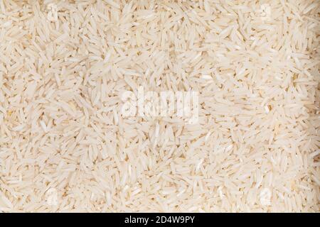 Top view full frame dry uncooked basmati rice Stock Photo