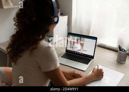 Female student study online on laptop at home Stock Photo