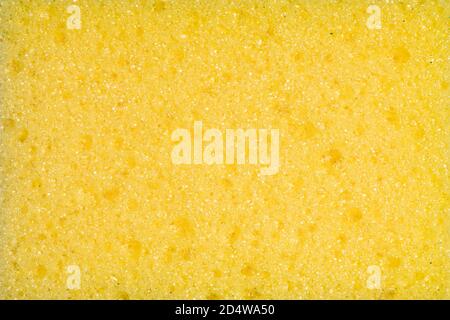 Top view full frame cleaning sponge, yellow side Stock Photo