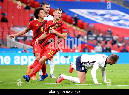 England's Jordan Henderson (right) goes down after being fouled by Belgium's Thomas Meunier resulting in a penalty for England during the UEFA Nations League Group 2, League A match at Wembley Stadium, London. Stock Photo
