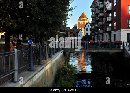 Kingston Upon Thames Guildhall and Charter Quay seen from the still River Thames, Surrey, England. Stock Photo