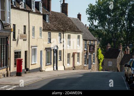 Malmesbury, Wiltshire, England, UK. 2020.  Businesses and homes on the High Street in Malmesbury, UK, Stock Photo