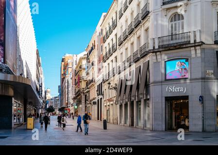 Madrid, Spain - 3rd October, 2020: View of Preciados Street during covid-19 confinement. It is one of the most famous shopping street in Madrid. Stock Photo