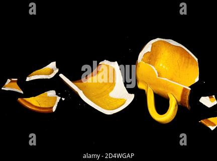 Broken Orange Coffe Cup Stock Photo