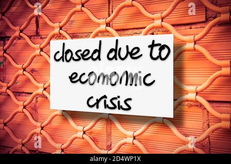 Closed due to economic crisis - concept image Stock Photo