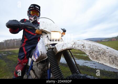 Motocross racing in the countryside Stock Photo