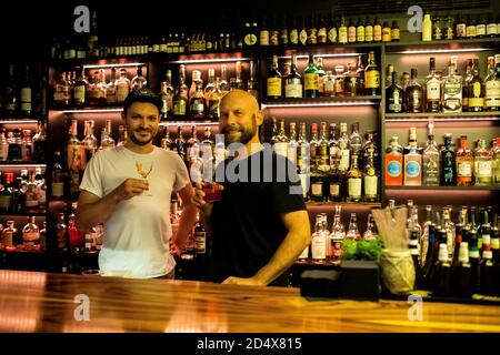 Freiburg, Germany. 09th Oct, 2020. Andreas Schöler (l) and Boris Gröner, the managers of the One Trick Pony Bar, are standing behind the counter in their bar. The Freiburg bar operators won one of the coveted prizes in the category 'Strategy & Future' at the online Mixology Bar Awards. Credit: Philipp von Ditfurth/dpa/Alamy Live News Stock Photo