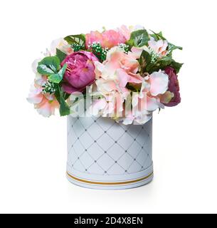 Flower arrangement in a cardboard white vase. Composition. Stock Photo