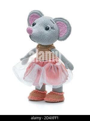 Knitted toy gray mouse in a dress on a white background Stock Photo