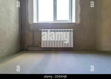 Room interior with radiator and without decoration Stock Photo