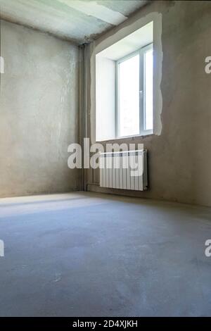 Room interior with radiator and without decoration Stock Photo