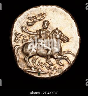 Rare Ancient Greek Coin, Calabria, Tarentum, Euphebe on a horse, Nike above with a Wreath Crown Stock Photo