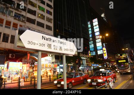 Nathan Road at night in Kowloon, Hong Kong, China. Nathan Road is a main commercial thoroughfare in Kowloon. Stock Photo