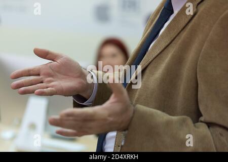 Selective focus on  teacher  while teaching and explaining lessons to students in classroom. Computer lab class, technology and aducation concept. Stock Photo
