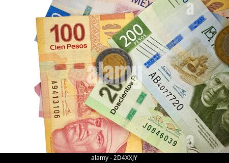 A group of 20 50 100 200 500 and 1000 mexican peso bills isolated on white background Stock Photo