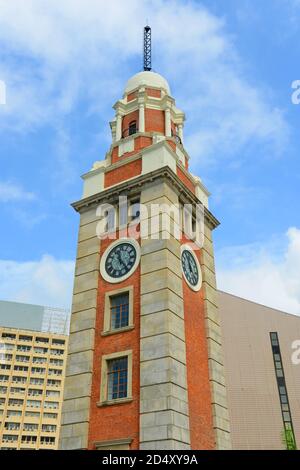 Colonial Clocktower Building Historic colonial-era building with its clock tower and palm trees in ...