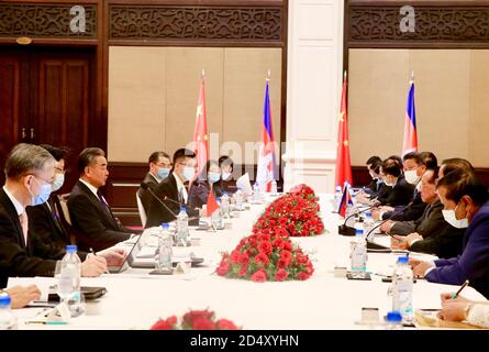 Phnom Penh, Cambodia. 11th Oct, 2020. Visiting Chinese State Councilor and Foreign Minister Wang Yi (3rd L) meets with Cambodian Deputy Prime Minister Hor Namhong (3rd R) in Phnom Penh, Cambodia, Oct. 11, 2020. Credit: Mao Pengfei/Xinhua/Alamy Live News Stock Photo