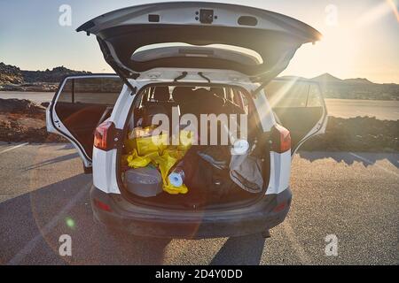 Trunk with stuff for camping Stock Photo - Alamy