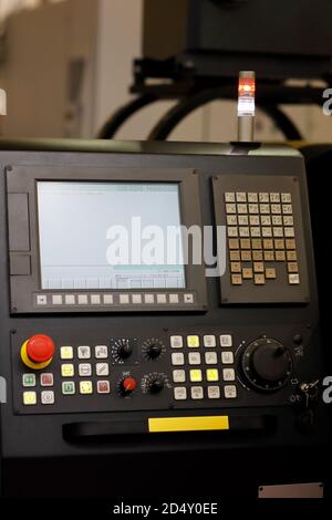 CNC machine control panel with alarm signal. Stock Photo
