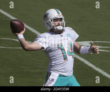 Santa Clara, United States. 11th Oct, 2020. Miami Dolphins quarterback Ryan Fitzpatrick (14) throws against the San Francisco 49ers in the second quarter at Levi's Stadium in Santa Clara, California on Sunday, October 11, 2020. The Dolphins beat the 49ers 43-17. Photo by Terry Schmitt/UPI Credit: UPI/Alamy Live News Stock Photo