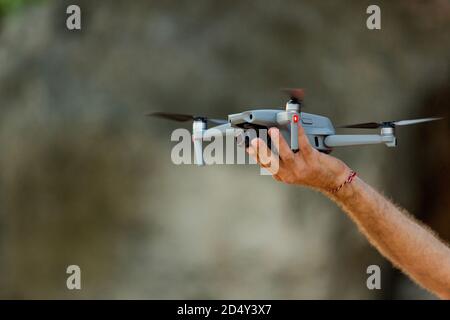 drone takes off from hand. natural background. high quality photo Stock Photo
