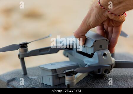 close-up. replacing the battery on the drone. natural background. high quality photo Stock Photo