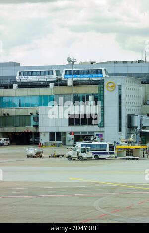 Frankfurt Airport terminal with a skytrain on the roof Stock Photo