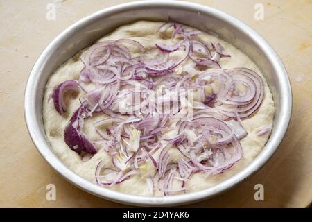 pizza dough with fresh tropea onion Stock Photo