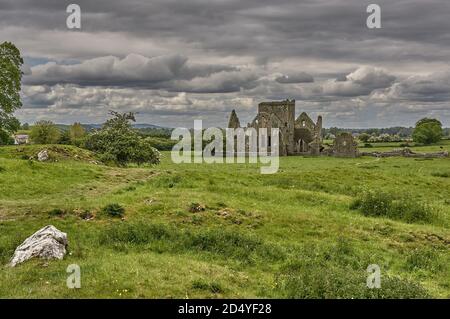 Mystic castle ruin in Ireland. Panoramic view of abandoned castle ruin in Ireland. Old castle ruin in Ireland. Stock Photo