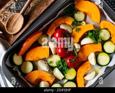 mediterranean oven vegetables raw and uncooked on a tray Stock Photo