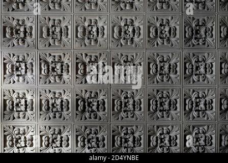 floral decorative style carved stone wall tiles in hereford cathedral, herefordshire, england Stock Photo