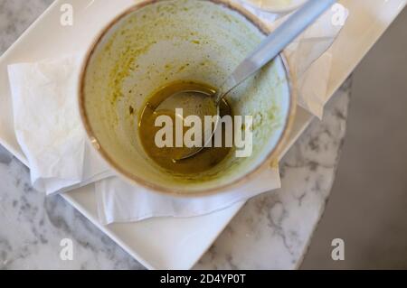 empty soup bowl on marble cafe table top Stock Photo
