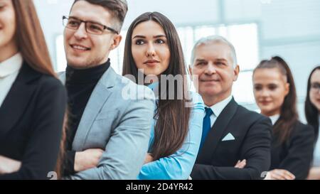 close up. a group of diverse smiling business people standing in a row Stock Photo
