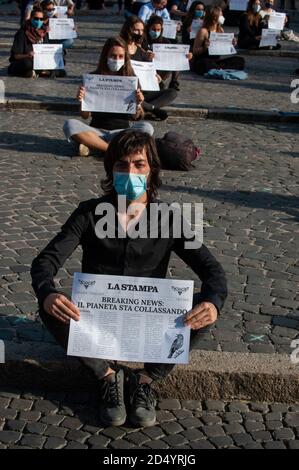 Rome, Italy 10/10/2020: Flash Mob by Extintion Rebellion activists, Piazza Esquilino. © Andrea Sabbadini Stock Photo