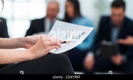 close up. business woman analyzing the financial schedule Stock Photo