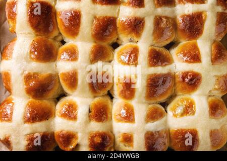 Close up of Homemade Easter traditional hot cross buns. Stock Photo