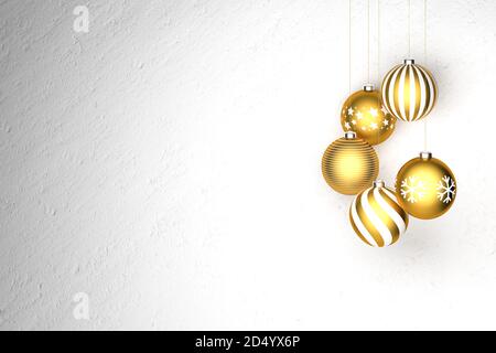 Golden and white Christmas Baubles with different designs hanging in ...