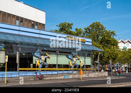 Cutman Friseur - Hairdresser with picture of Super hero with comb and hair-drier on window in  Steglitz,Berlin, Germany. Stock Photo