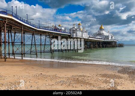 Eastbourne Pier completed in 1872 is 300 metres long. Built on stilts that rest on cups on the sea bed. Allowing the pier to move in bad weather. Stock Photo