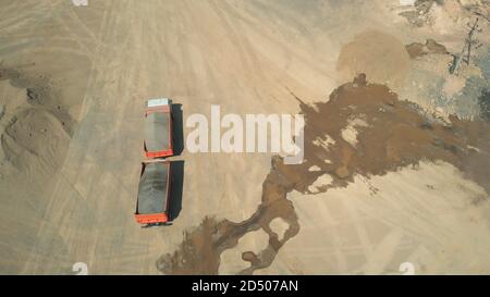 Top view of orange truck with trailer. Stock Photo