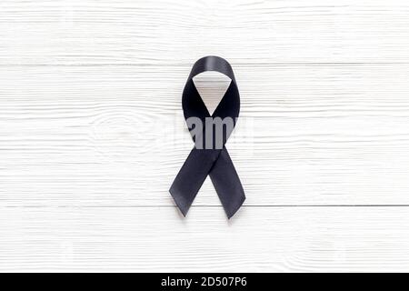 Black ribbon as mourning symbol top view Stock Photo