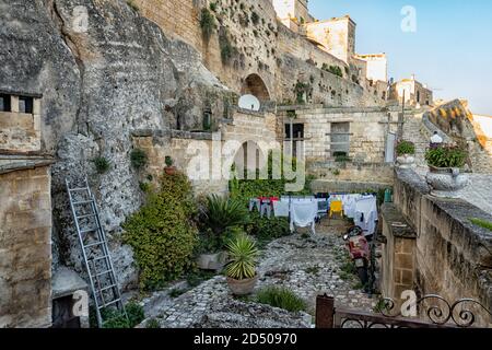 House with patio in the ancient cave city of Matera, Puglia, Italy, an Unesco World Heritage site. Stock Photo