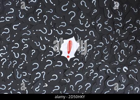 Exclamation mark on a question mark background. Concept of decision, faq, q&a and riddle Stock Photo