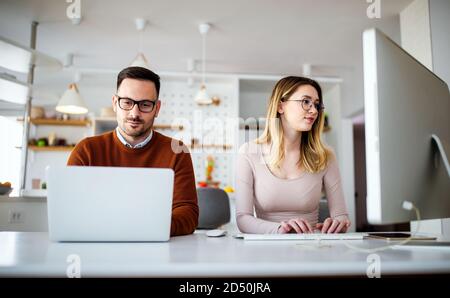 Young creative managers team working with new startup project in office Stock Photo